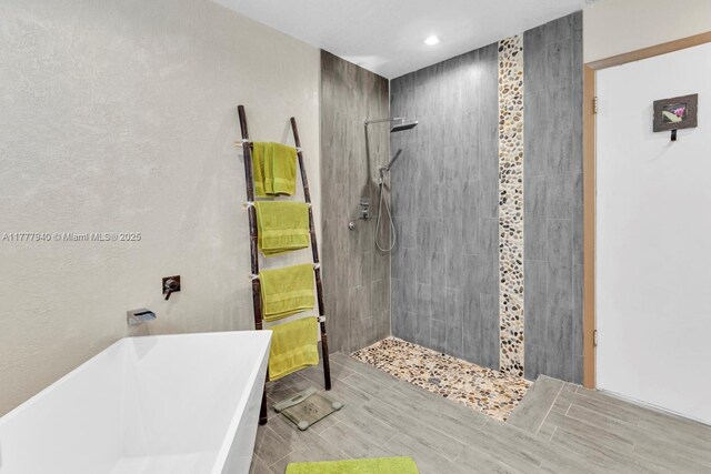 14811 Archerhall St, Davie, FL 33331 - full bath with tiled shower, a freestanding tub, and recessed lighting