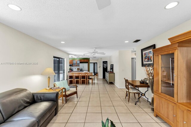 14811 Archerhall St, Davie, FL 33331 - living area with a ceiling fan, light tile patterned flooring, and recessed lighting