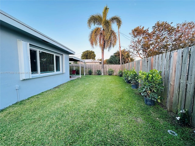 view of yard featuring a fenced backyard