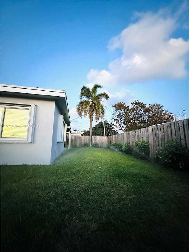 view of yard featuring a fenced backyard
