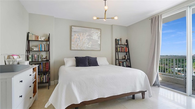 2400 SW 27th Ave Unit 706, Miami, FL 33145 - bedroom featuring a chandelier, access to exterior, and light tile patterned flooring
