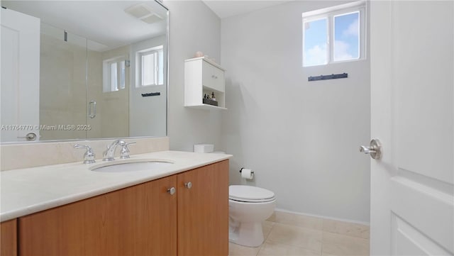 2400 SW 27th Ave Unit 706, Miami, FL 33145 - bathroom featuring toilet, vanity, a shower stall, tile patterned flooring, and baseboards