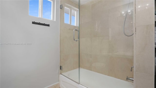 2400 SW 27th Ave Unit 706, Miami, FL 33145 - full bathroom featuring enclosed tub / shower combo and baseboards
