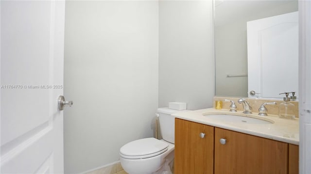 2400 SW 27th Ave Unit 706, Miami, FL 33145 - half bathroom with vanity, toilet, and tile patterned flooring