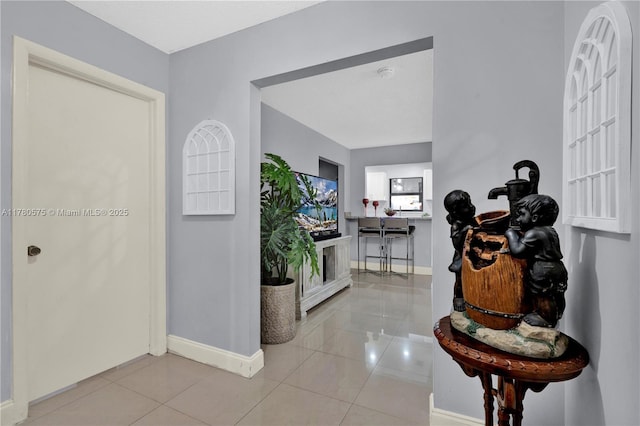 14723 SW 86th Ln, Miami, FL 33193 - hall featuring baseboards and tile patterned flooring