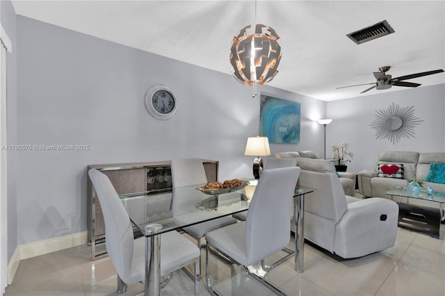 14723 SW 86th Ln, Miami, FL 33193 - dining area featuring ceiling fan, a textured ceiling, and tile patterned floors