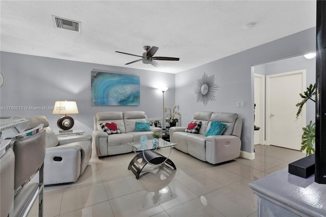 14723 SW 86th Ln, Miami, FL 33193 - living room with a ceiling fan, light tile patterned floors, and a textured ceiling