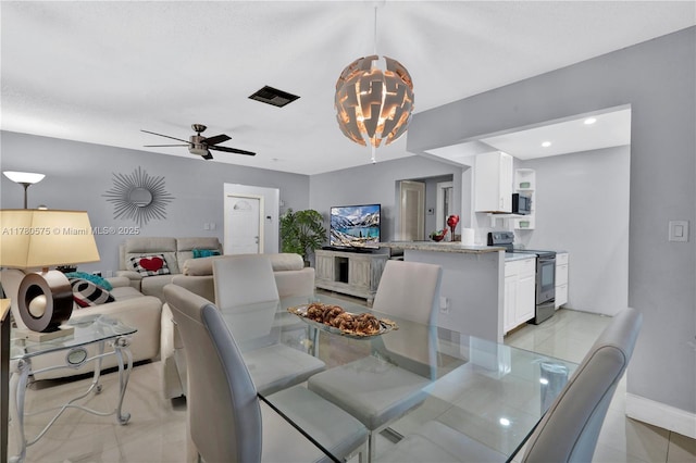 14723 SW 86th Ln, Miami, FL 33193 - dining area featuring a ceiling fan, light tile patterned floors, and recessed lighting