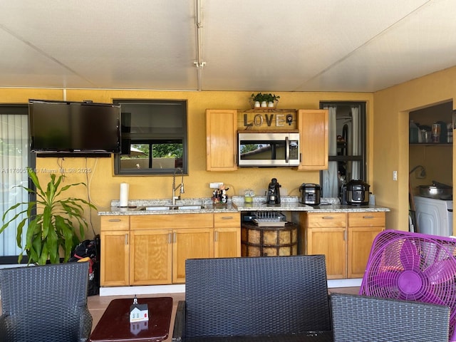 14723 SW 86th Ln, Miami, FL 33193 - kitchen with stainless steel microwave and light stone counters