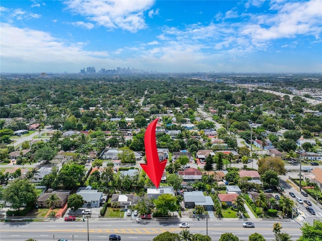 drone / aerial view featuring a city view