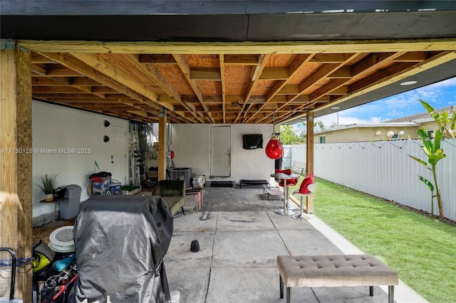 view of patio with fence and area for grilling