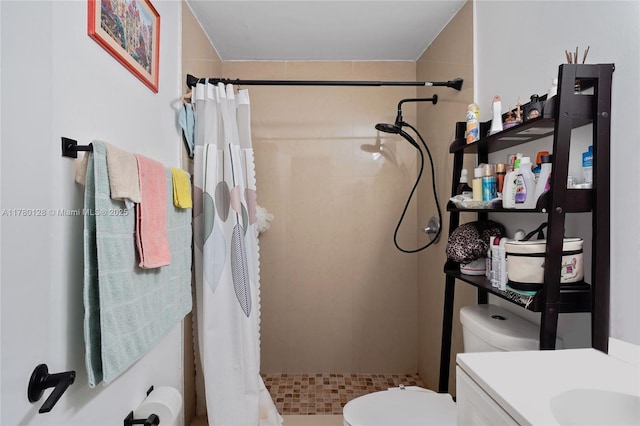 full bathroom featuring toilet and a stall shower