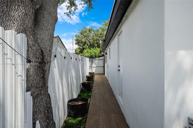 view of home's exterior with a fenced backyard and stucco siding