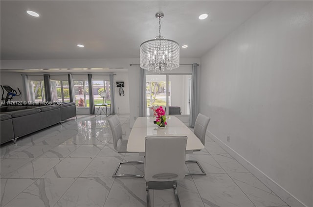 1901 NE 186th Dr, North Miami Beach, FL 33179 - dining area with recessed lighting, a notable chandelier, marble finish floor, and baseboards