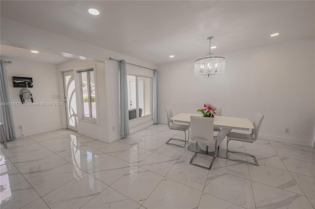 1901 NE 186th Dr, North Miami Beach, FL 33179 - dining area with recessed lighting, marble finish floor, and baseboards