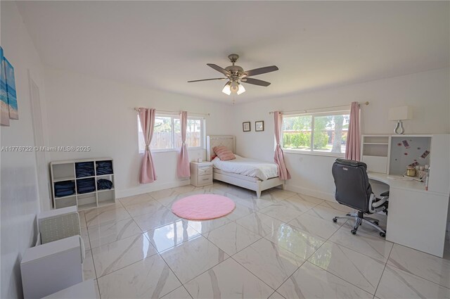 1901 NE 186th Dr, North Miami Beach, FL 33179 - bedroom featuring ceiling fan, marble finish floor, and baseboards