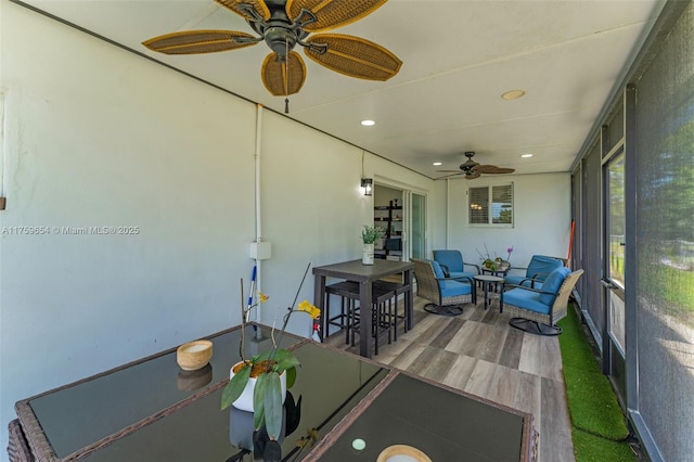 19050 SW 144th Ave, Miami, FL 33177 - sunroom featuring ceiling fan and outdoor dining area