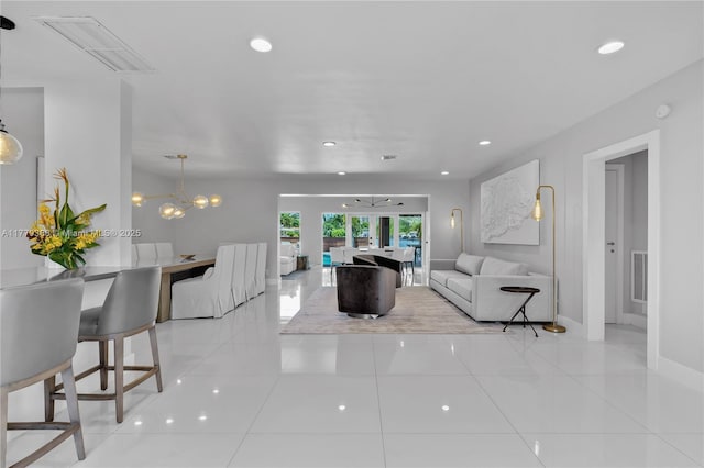 2243 Bayview Ln, North Miami, FL 33181 - living room with visible vents, recessed lighting, and light tile patterned floors
