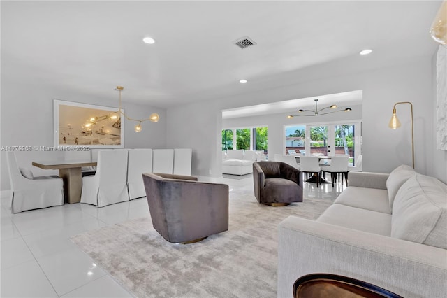 2243 Bayview Ln, North Miami, FL 33181 - living area with an inviting chandelier, tile patterned flooring, recessed lighting, and visible vents