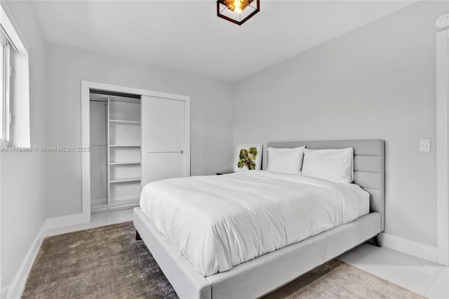 2243 Bayview Ln, North Miami, FL 33181 - bedroom featuring baseboards and a closet
