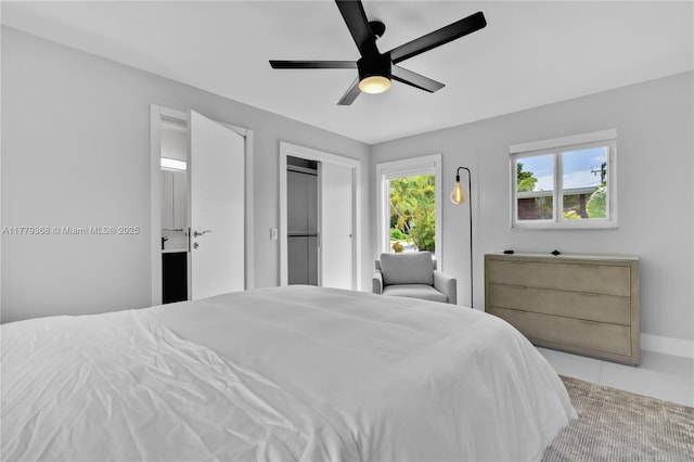 2243 Bayview Ln, North Miami, FL 33181 - bedroom with baseboards and ceiling fan