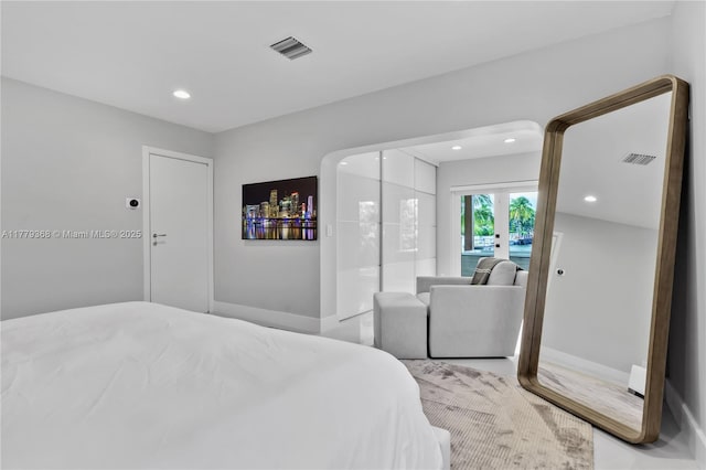2243 Bayview Ln, North Miami, FL 33181 - bedroom featuring baseboards, light carpet, recessed lighting, and visible vents