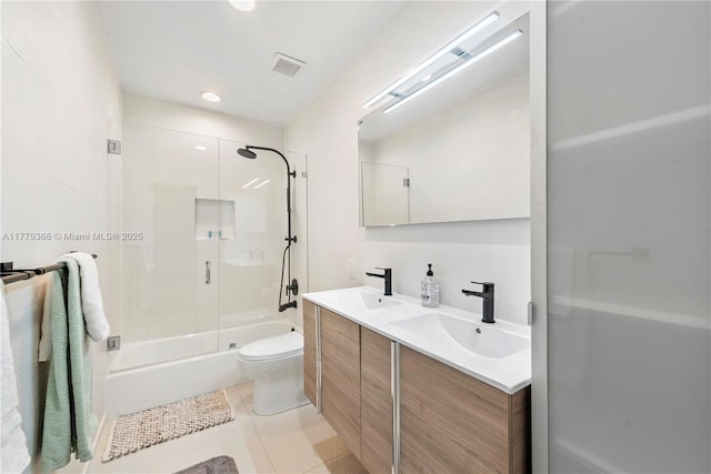 2243 Bayview Ln, North Miami, FL 33181 - bathroom with a sink, toilet, double vanity, and visible vents