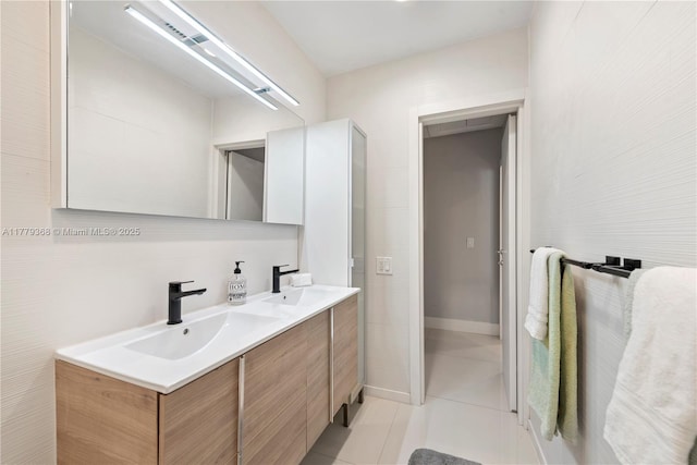 2243 Bayview Ln, North Miami, FL 33181 - bathroom featuring double vanity, a sink, and tile patterned flooring