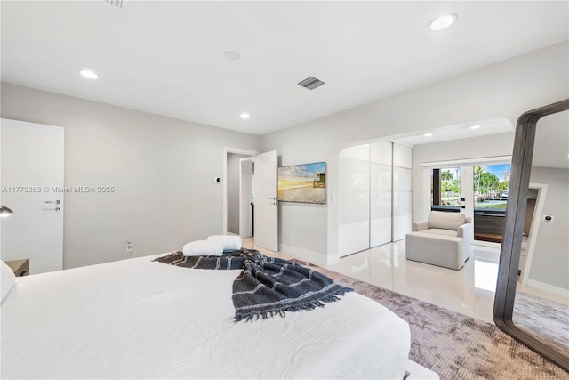 2243 Bayview Ln, North Miami, FL 33181 - tiled bedroom featuring baseboards, access to exterior, recessed lighting, and visible vents