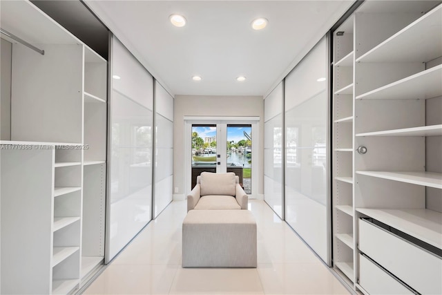 2243 Bayview Ln, North Miami, FL 33181 - spacious closet featuring light tile patterned flooring