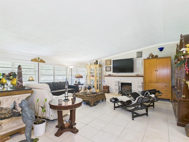 19341 Holiday Rd, Cutler Bay, FL 33157 - living room featuring light tile patterned floors, a fireplace with raised hearth, and crown molding