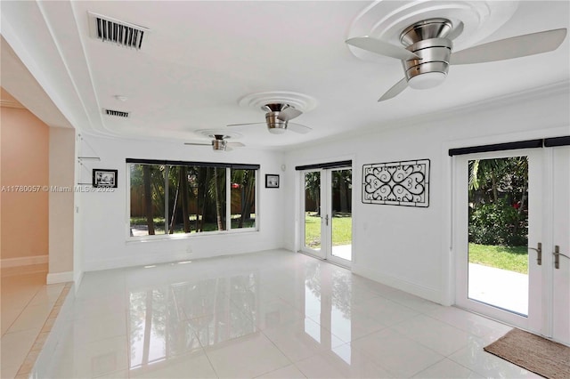 13130 NW 1st Ave, Miami, FL 33168 - unfurnished room featuring a ceiling fan, french doors, healthy amount of natural light, and light tile patterned floors