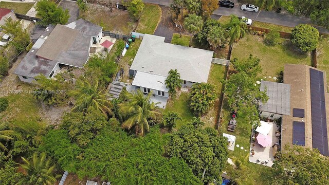 birds eye view of property with a residential view