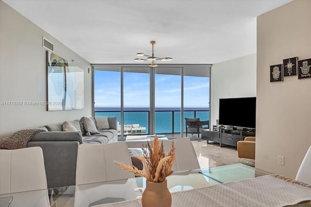 3101 S Ocean Dr Unit 2307, Hollywood, FL 33019 - living room featuring visible vents and floor to ceiling windows