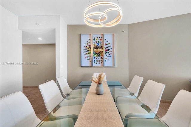 3101 S Ocean Dr Unit 2307, Hollywood, FL 33019 - dining room featuring an inviting chandelier
