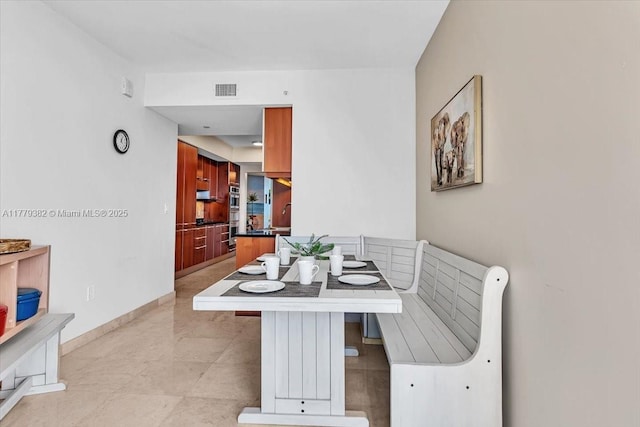 3101 S Ocean Dr Unit 2307, Hollywood, FL 33019 - dining room with visible vents and baseboards