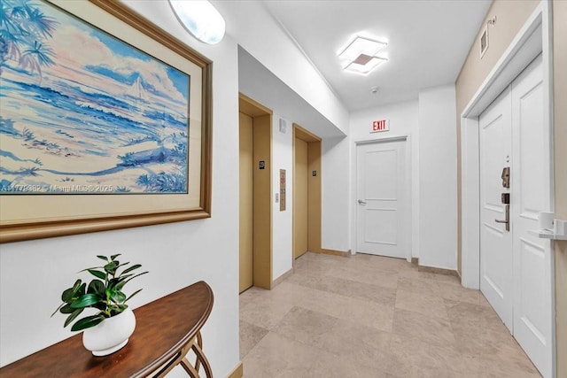 3101 S Ocean Dr Unit 2307, Hollywood, FL 33019 - hallway with visible vents, elevator, and baseboards