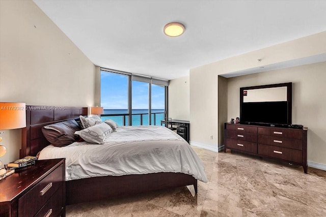 3101 S Ocean Dr Unit 2307, Hollywood, FL 33019 - bedroom featuring baseboards and floor to ceiling windows