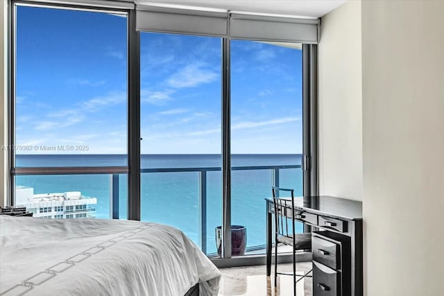 3101 S Ocean Dr Unit 2307, Hollywood, FL 33019 - bedroom featuring floor to ceiling windows, multiple windows, and a water view