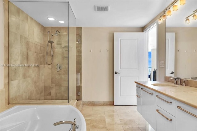 3101 S Ocean Dr Unit 2307, Hollywood, FL 33019 - bathroom featuring a bath, a stall shower, vanity, and visible vents