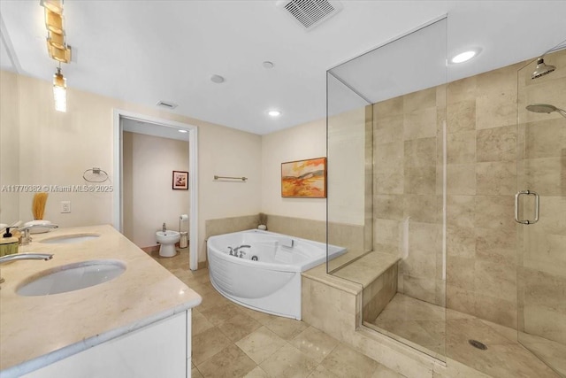 3101 S Ocean Dr Unit 2307, Hollywood, FL 33019 - full bathroom with a sink, visible vents, a shower stall, and a garden tub