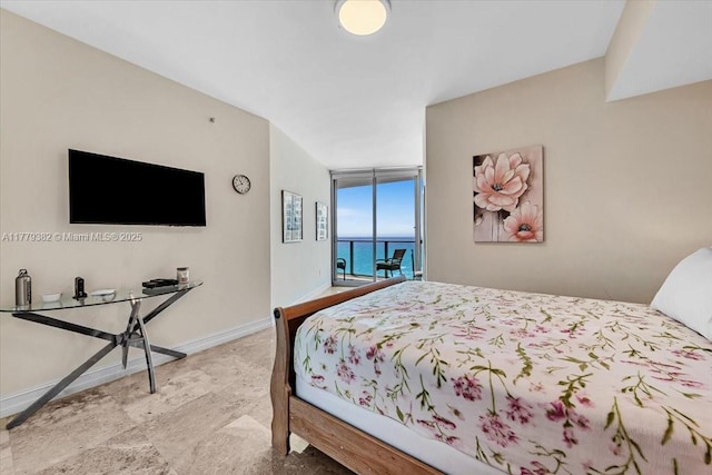 3101 S Ocean Dr Unit 2307, Hollywood, FL 33019 - bedroom with baseboards, access to exterior, and floor to ceiling windows