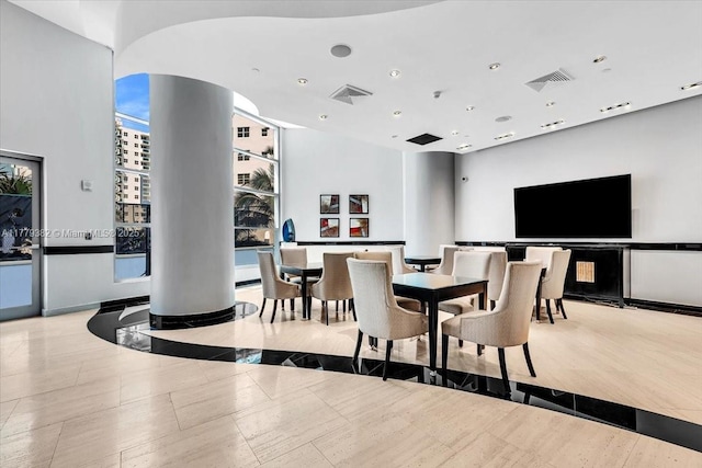 3101 S Ocean Dr Unit 2307, Hollywood, FL 33019 - dining space with recessed lighting, visible vents, ornate columns, and baseboards