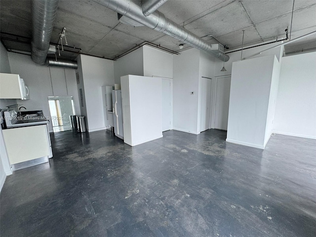10 SW S River Dr Unit 812, Miami, FL 33130 - garage with baseboards