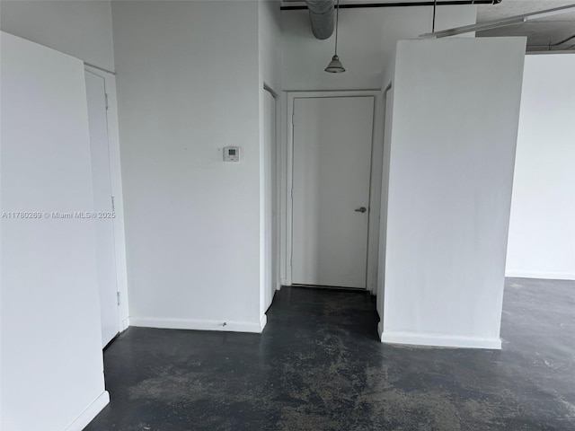 10 SW S River Dr Unit 812, Miami, FL 33130 - empty room with concrete flooring and baseboards