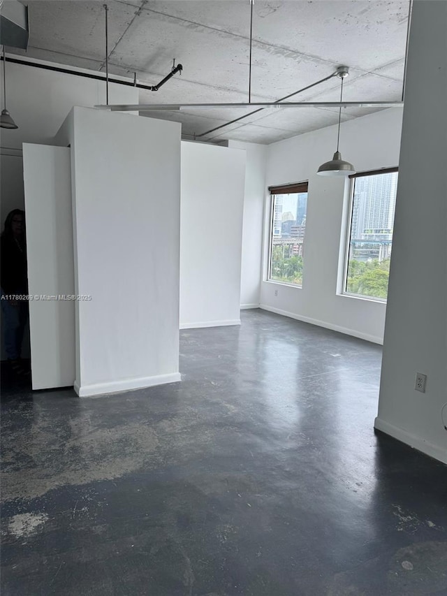 10 SW S River Dr Unit 812, Miami, FL 33130 - unfurnished room with concrete floors and baseboards