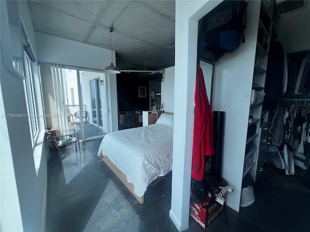 10 SW S River Dr Unit 812, Miami, FL 33130 - bedroom featuring finished concrete flooring and access to outside