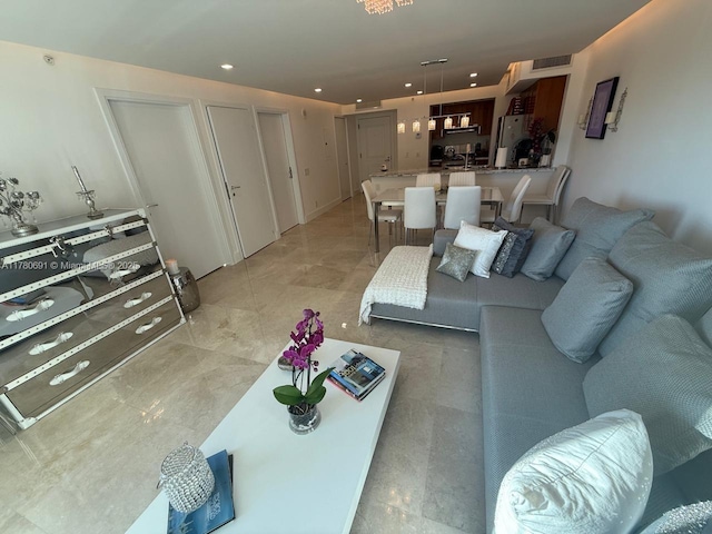 9499 Collins Ave Unit 411, Surfside, FL 33154 - living room featuring recessed lighting