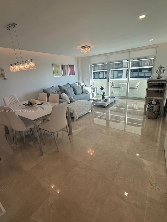 9499 Collins Ave Unit 411, Surfside, FL 33154 - dining room with marble finish flooring