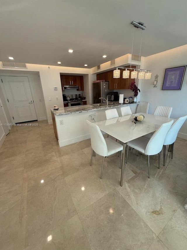 9499 Collins Ave Unit 411, Surfside, FL 33154 - dining area with recessed lighting